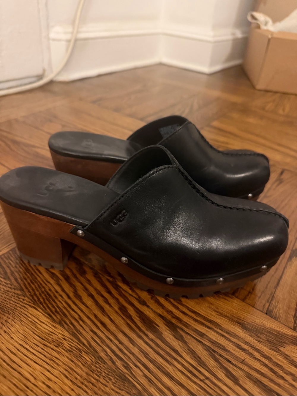 UGG Black Leather mules worn once- size 8